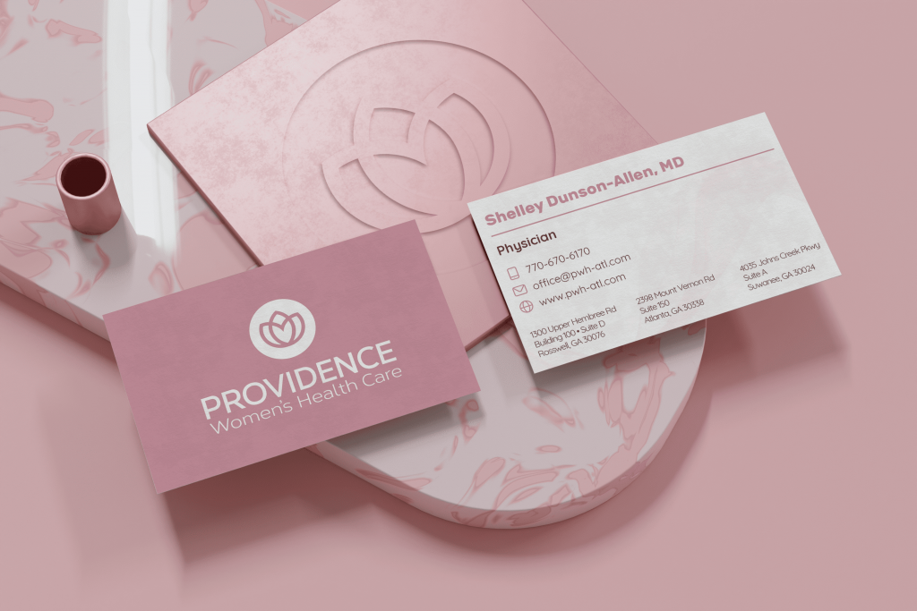 Providence Visitenkarten Set auf rosa Hintergrund