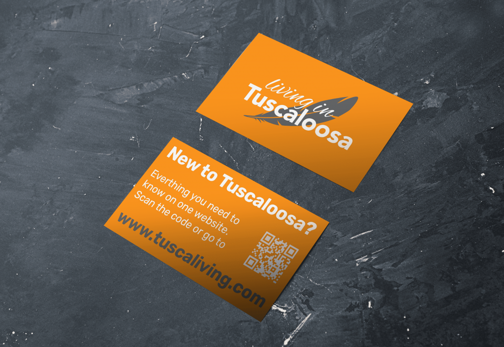 Orange Tuscaloosa-Visitenkarten auf dunklem Untergrund