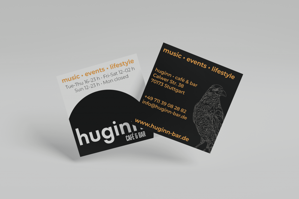 Zwei quadratische huginn-Visitenkarten in Schwarz/Orange